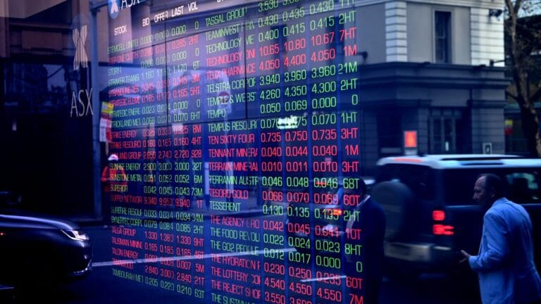 Wall St. Cheers, But Aussie Banks & Energy Collapse