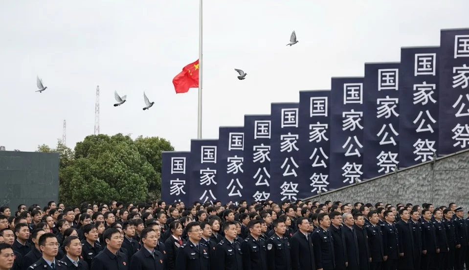 China Holds Subdued Nanjing Memorial Amid Japan Row